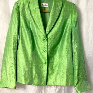 New Year’s Eve? What to wear? A vivid green jacket! It glistens in the lights!